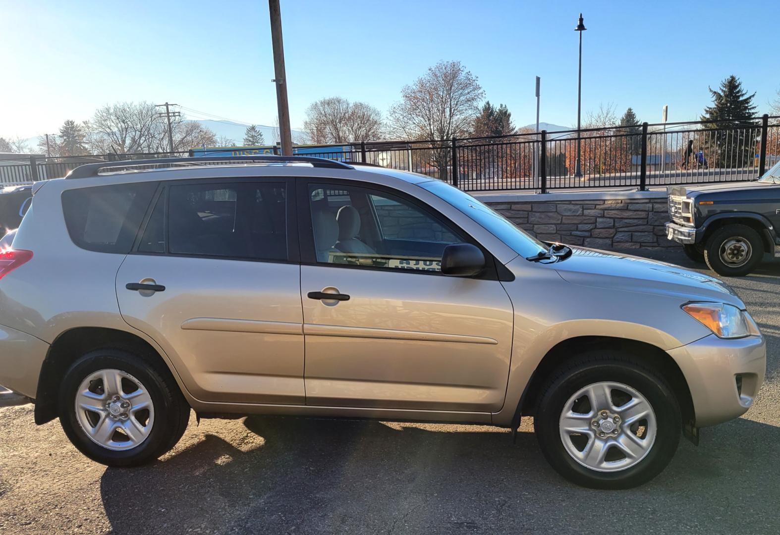 2010 Gold /Tan Toyota RAV4 I4 (2T3BF4DV7AW) with an 2.5L engine, Automatic transmission, located at 450 N Russell, Missoula, MT, 59801, (406) 543-6600, 46.874496, -114.017433 - Great Running AWD SUV. Air. Cruise. Tilt. Power Windows and Locks. Very Clean. - Photo#4